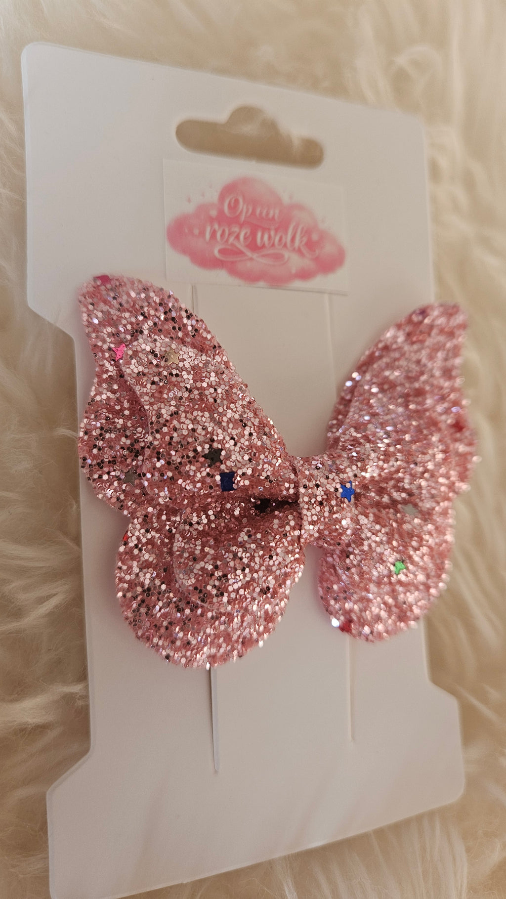 Vlinder haarclip glitter roze