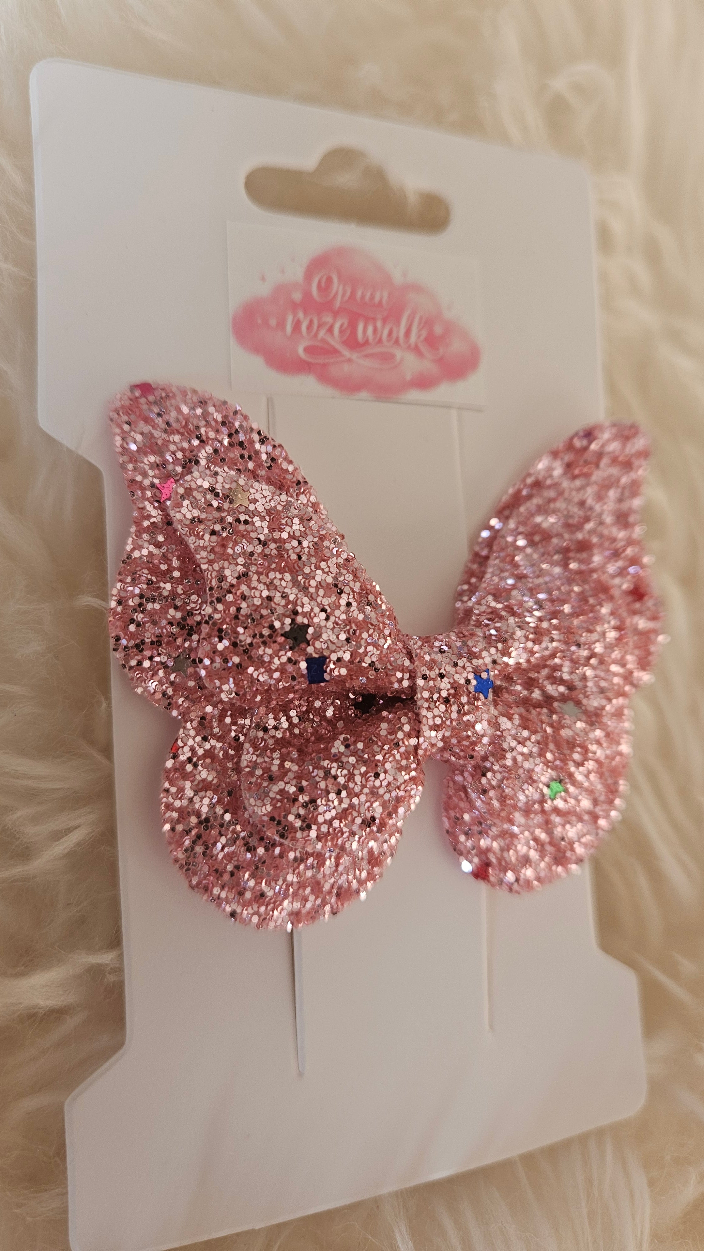 Vlinder haarclip glitter roze